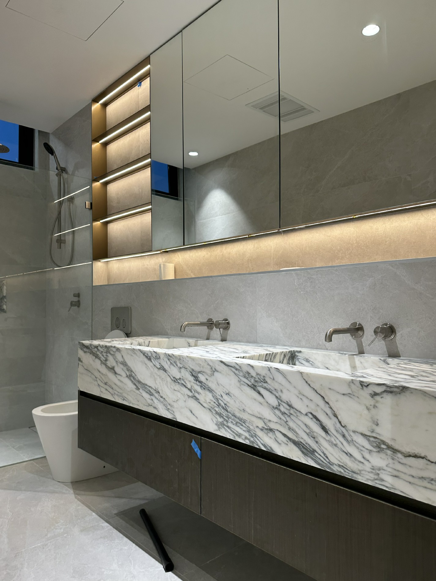 Contemporary Oak and Stone Joinery Project in Northbridge  Marble Kitchen Island  Textured Firepla
