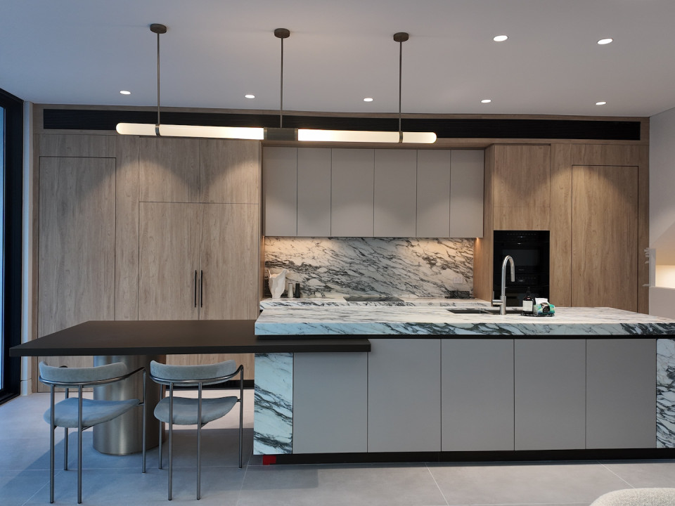 Contemporary Oak and Stone Joinery Project in Northbridge | Marble Kitchen Island & Textured Firepla