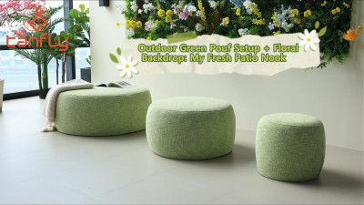 จัดวางเบาะนั่งทรงกลมสีเขียวสำหรับกลางแจ้ง พร้อมฉากหลังเป็นดอกไม้: My Fresh Patio Nook